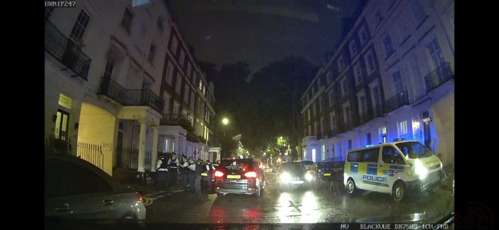 Large Number Of Police Detain Minicab Driver  On Sussex Place In West London