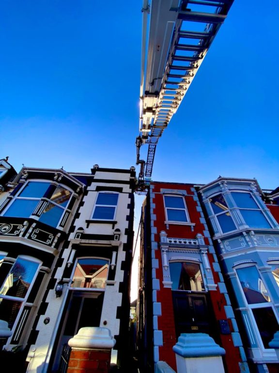 Firefighters Use An Aerial Ladder To Remove Dangerous Cast Iron Pipe From Southsea Home After Concerns For Public Safety