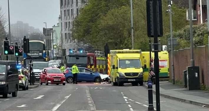 Motorcycle Collision Halts Flow of Traffic