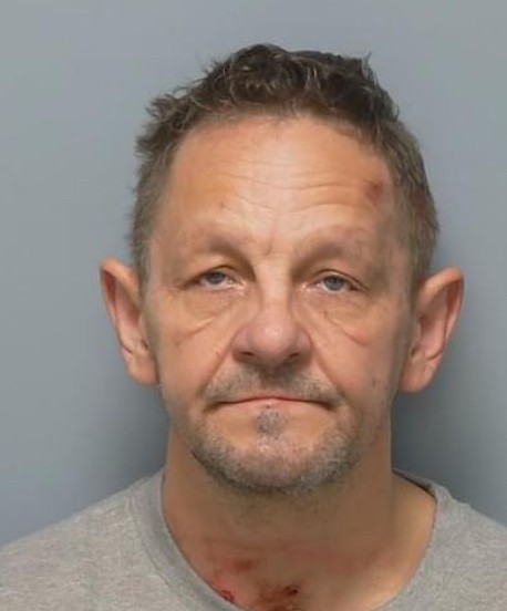 A man who detonated a low explosive device in the presence of police officers has been jailed