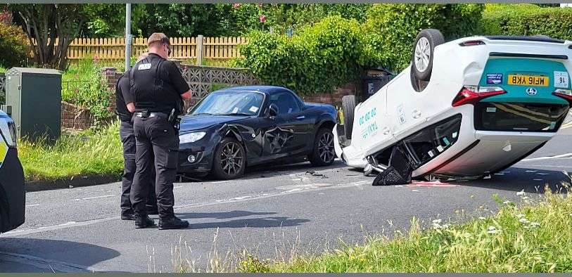 CAB CHAOS! Brighton Taxi Flips, Crashes into Parked Car