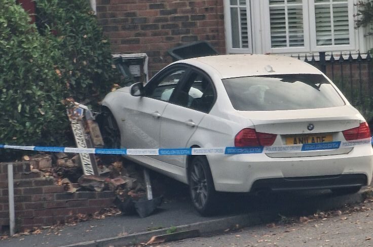 Driver Flees Scene After BMW Crashes Into House in Crawley