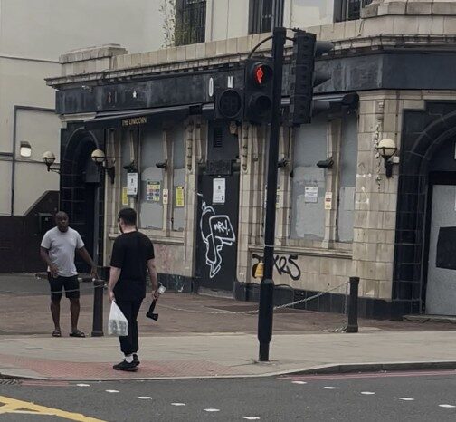 Man arrested after reports of axe seen in Camden Road