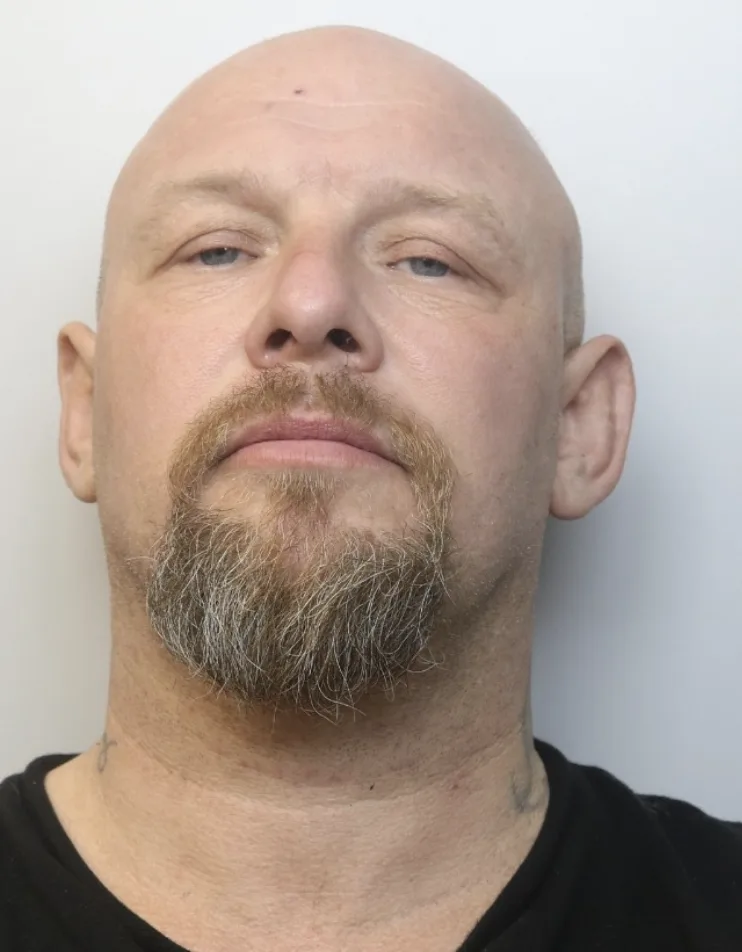 Thug Jailed for Shoving Pensioner into Road and Snatching Handbag