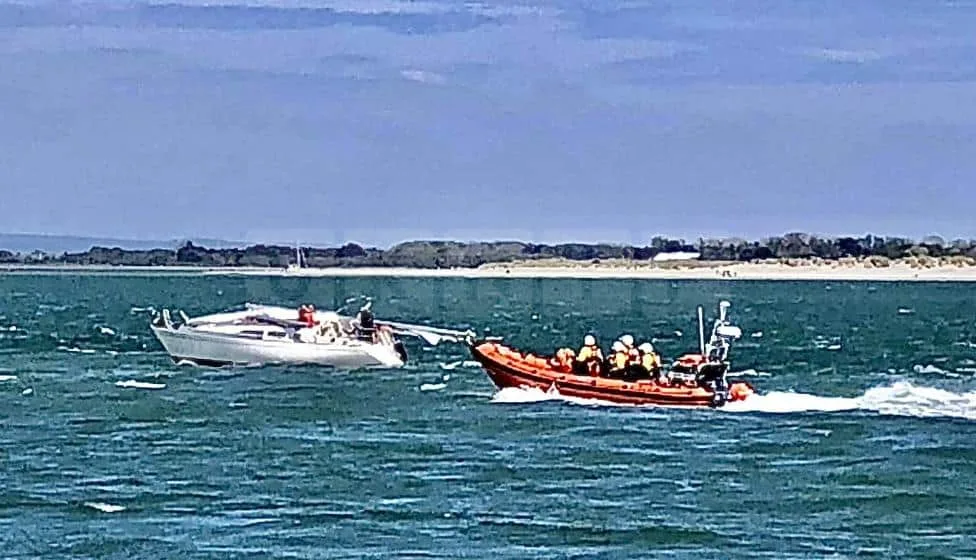 Hayling Lifeboats Race to Rescue Two Yachts in One Day â€“ Eight Saved Including Beloved Dog!