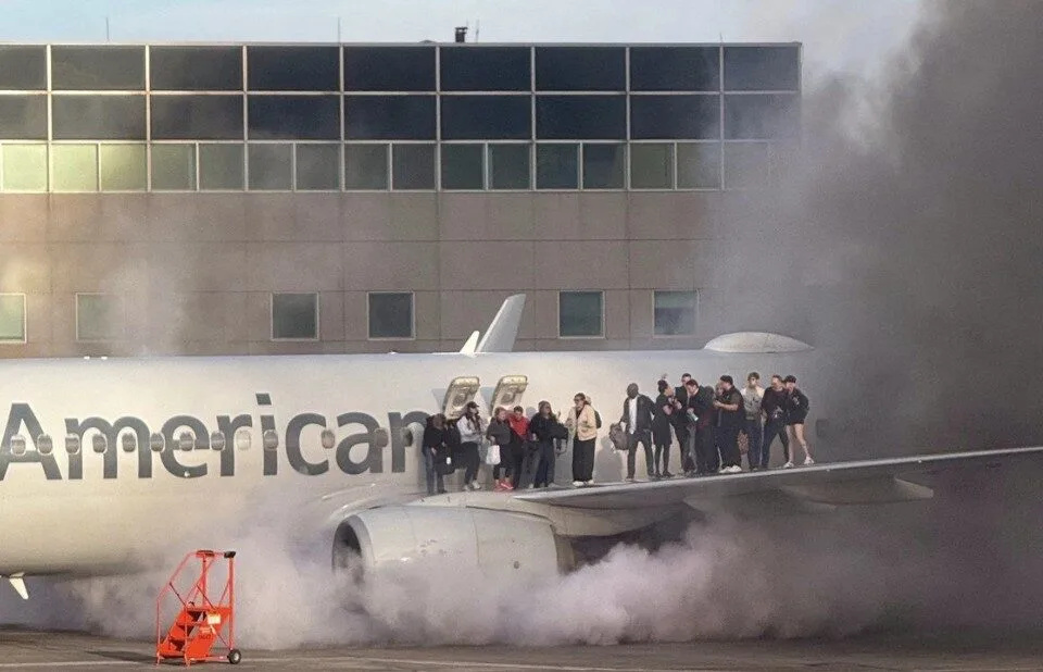 American Airlines Flight AA3023 Evacuated in Denver After Landing Gear Fire
