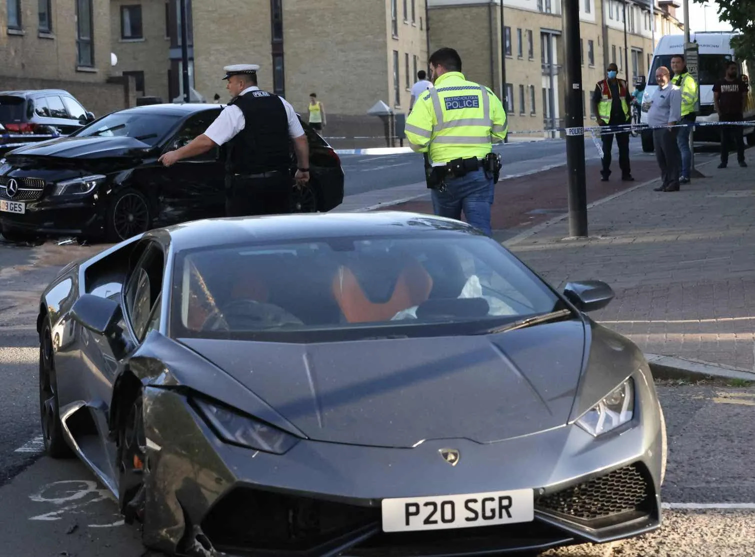 UPDATED:Manhunt launched after driver of Â£200K Lamborghini Huracan that was racing is involved in a three vehicle hit and run collision i…