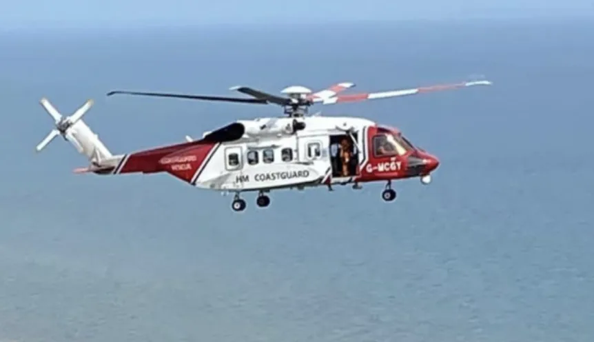 Emergency responders rescue people from Christmas Day Swim