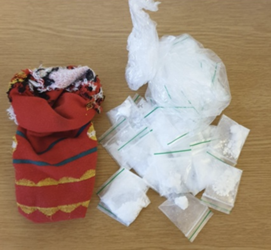 Two Sentenced for Concealing Cocaine in Vehicle Sock During Drug Operation