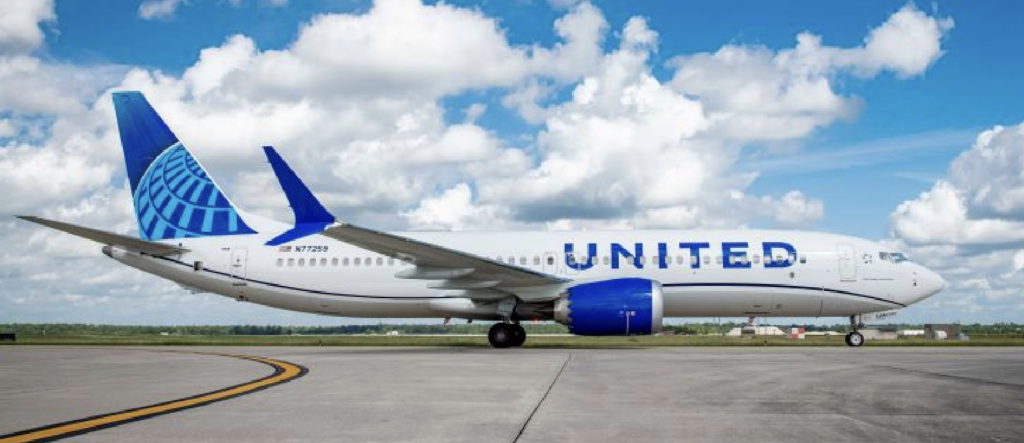 Passenger Attempts Door Opening Mid-Flight on International Flight