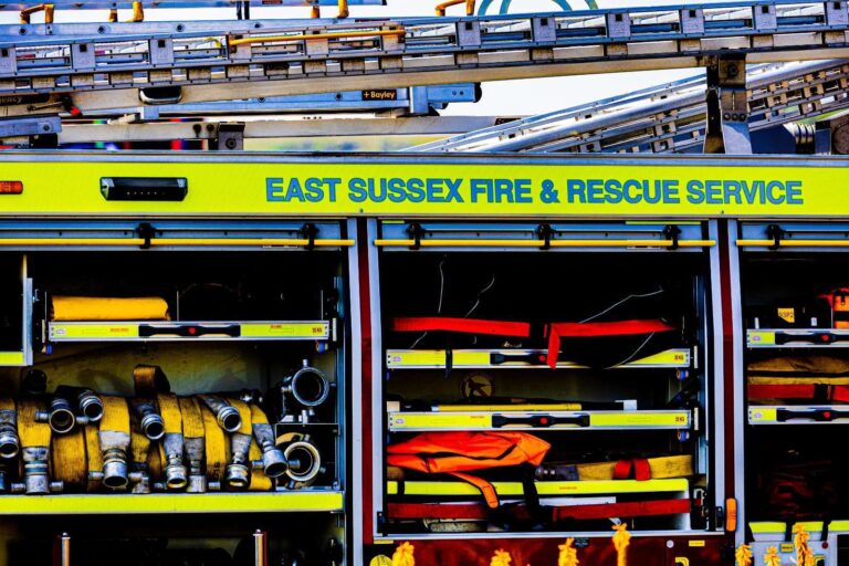 Firefighters Combat Roof Fire at Residential Property