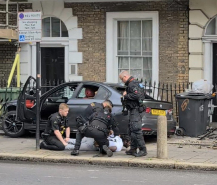 Man Arrested Following Police Chase Ending in Overturned Police Vehicle