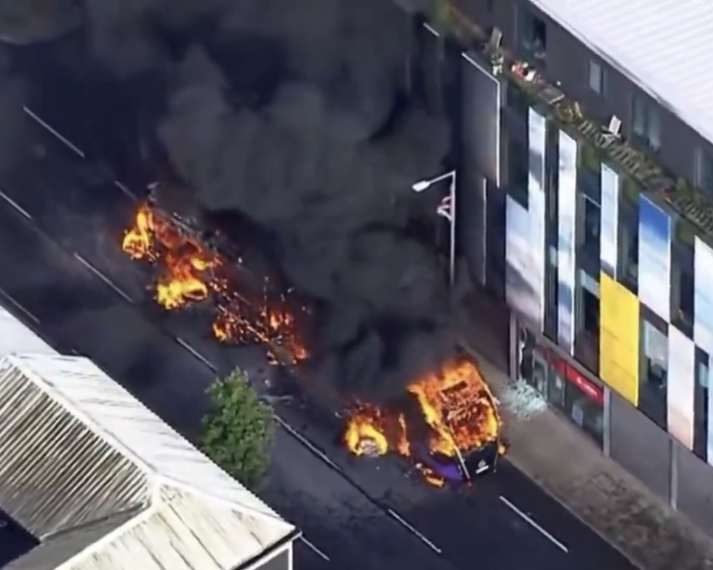 Bus Set Ablaze Amid Protests Following Sudanese Migrant Charge