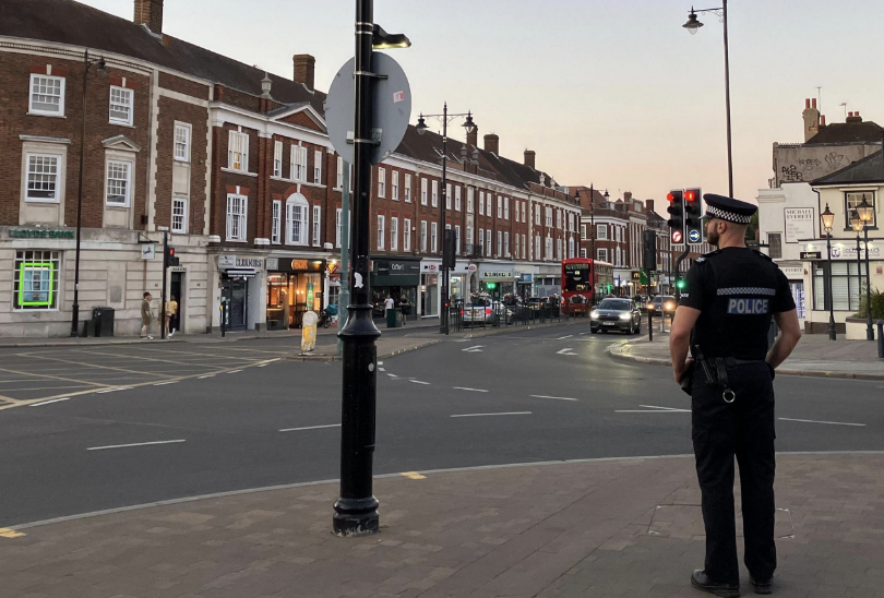 Police Cordon Off Epsom High Street After Man Found Critically ill
