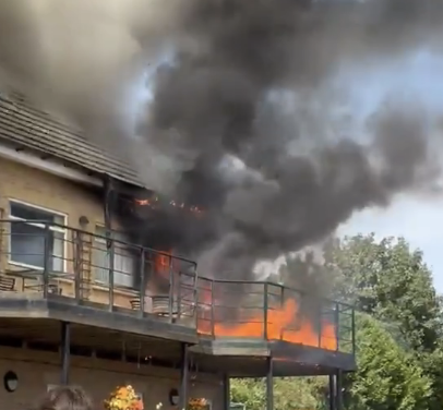 Huge fire destroys roof of Kingsthorpe Golf Club as crews battle blaze