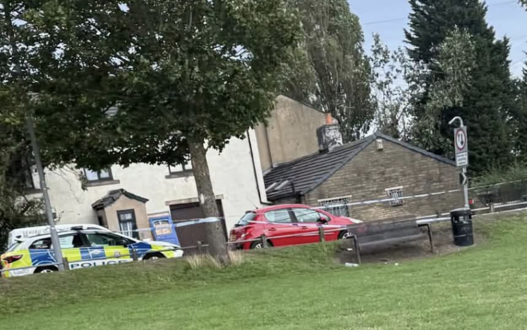 Police cordon in place on Bierley Lane Bradford as officers remain at scene