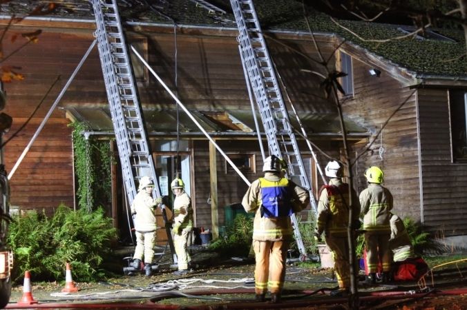 Fire Crews Battle To Save Surrey Property After Roof Fire