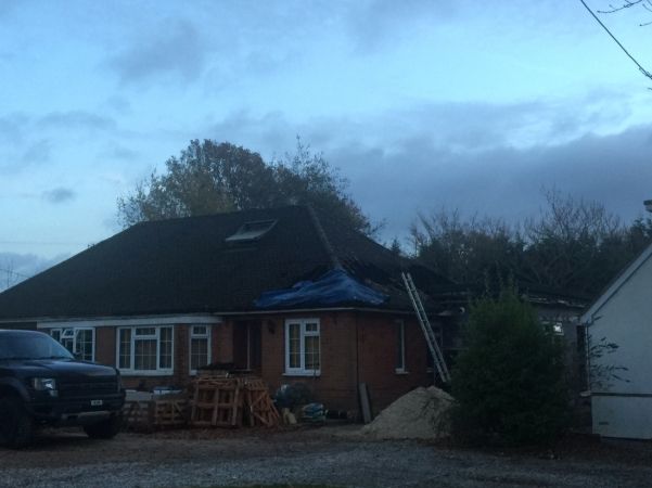 Fire Crews Tackle Serve Roof Fire At Bungalow Near Winchester