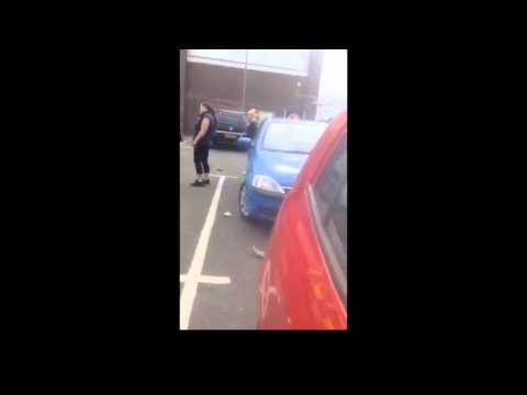 A Crazy Man Smashes Up A Police Car