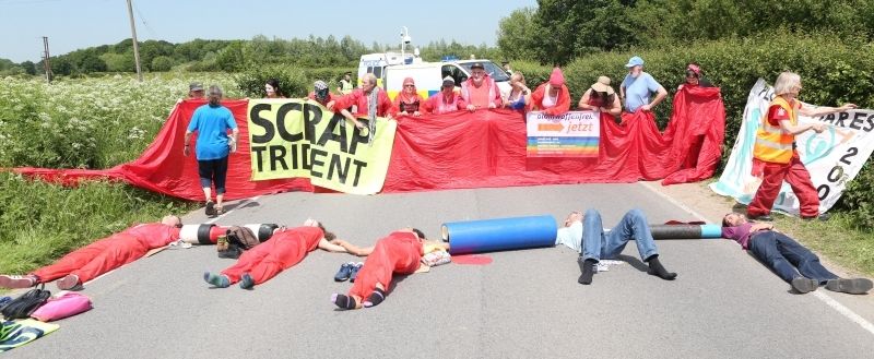 Anti-nuclear Protesters Chain Themselves Together Outside Weapons Establishment