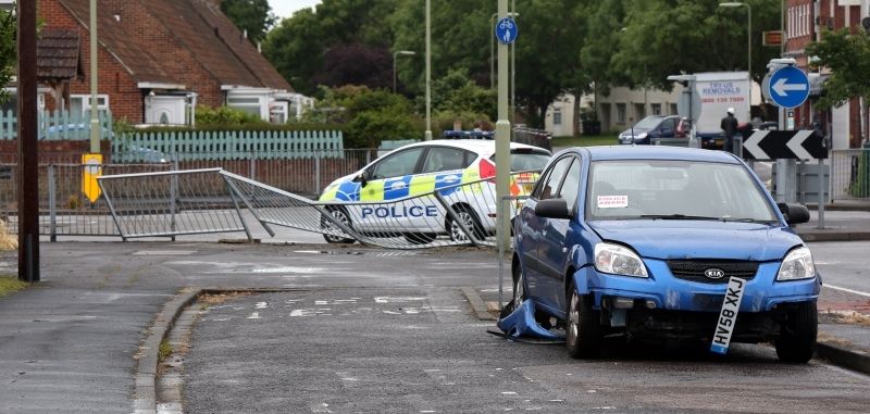 Car Mounts Roundabout Hits Railing And Lands In Garden In Gosport