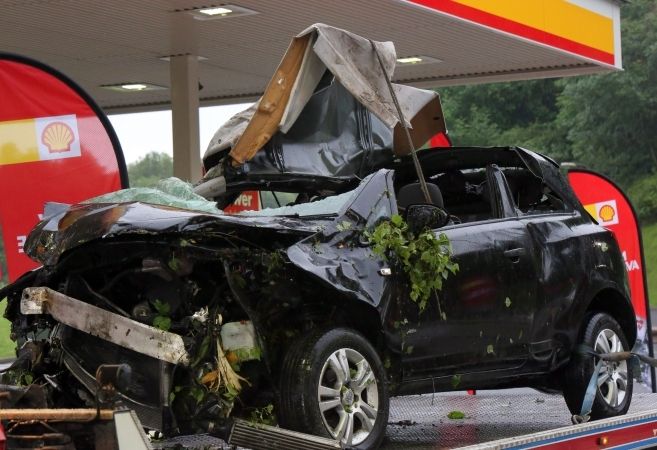 Fire Crews Battle To Free Driver After Car Hits Embankment On A3
