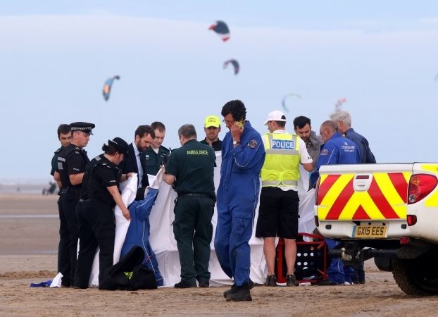 Man's Body Recovered From Beach After Being Swept Out To Sea With Two Other Men Left Fighting For Their Lives