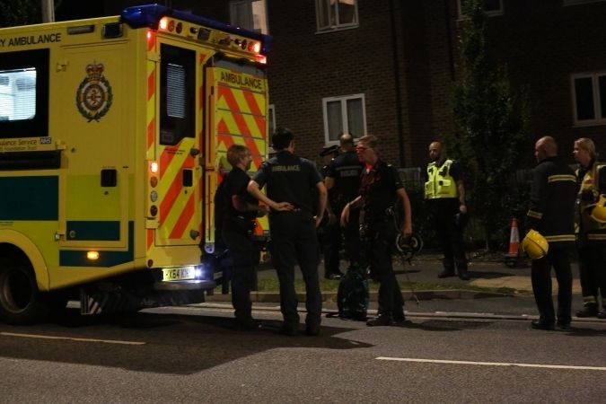 After 25 Hours Standoff Man Jumps  Off Building And Is Rushed To Hospital
